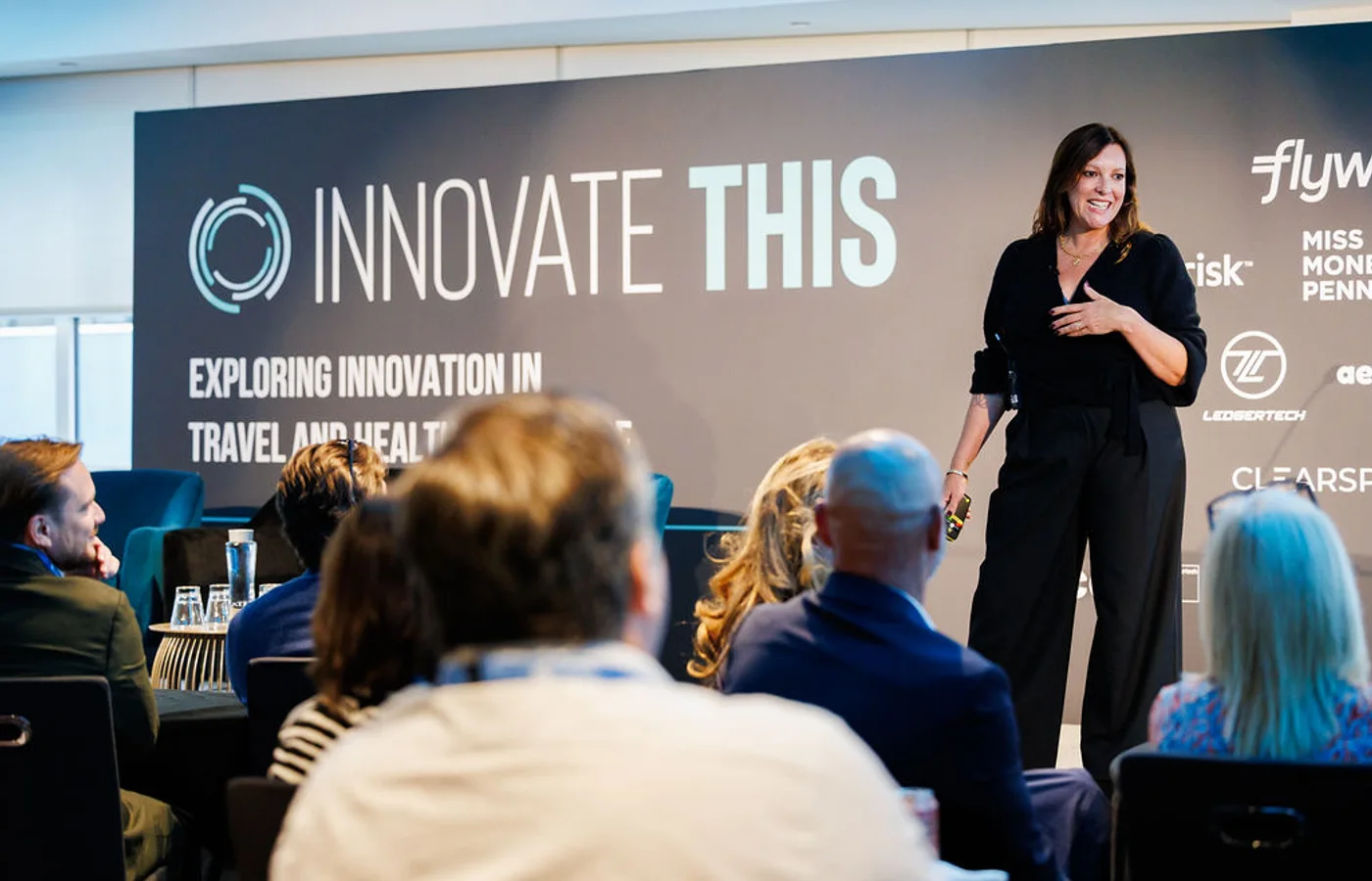 Kate Southerby speaking on stage at Innovate This 2025