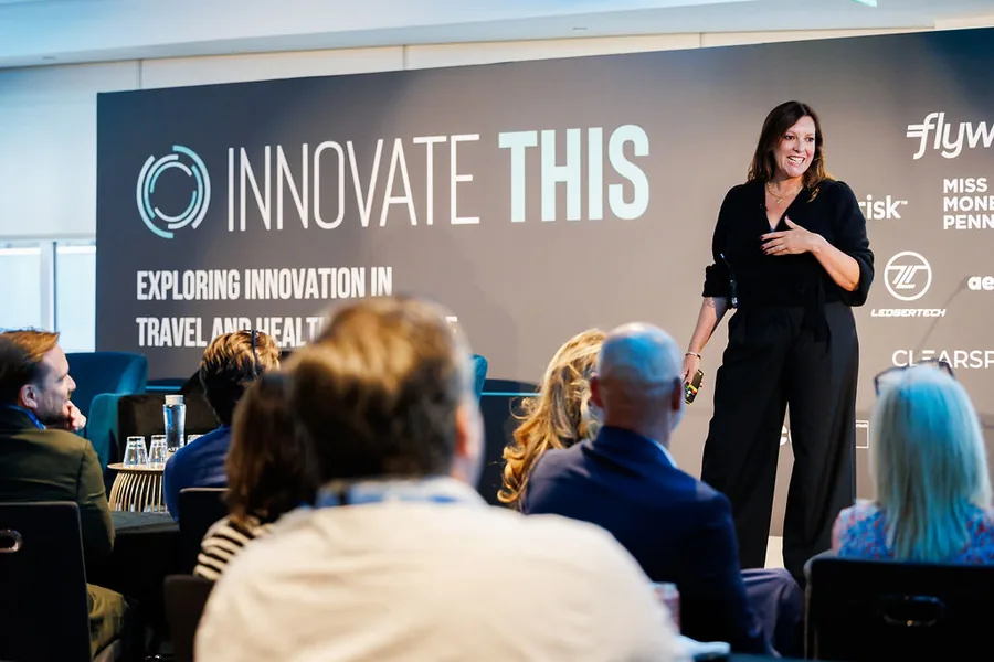 Kate Southerby speaking on stage at Innovate This 2025